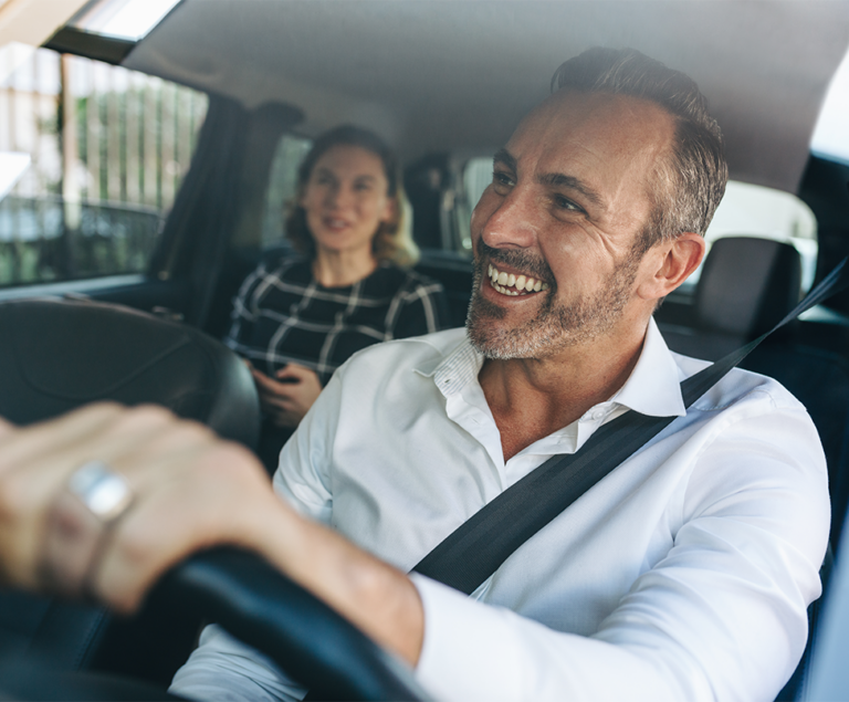 Driver using ARC Europe Smartcall white-label digital roadside assistance solution
